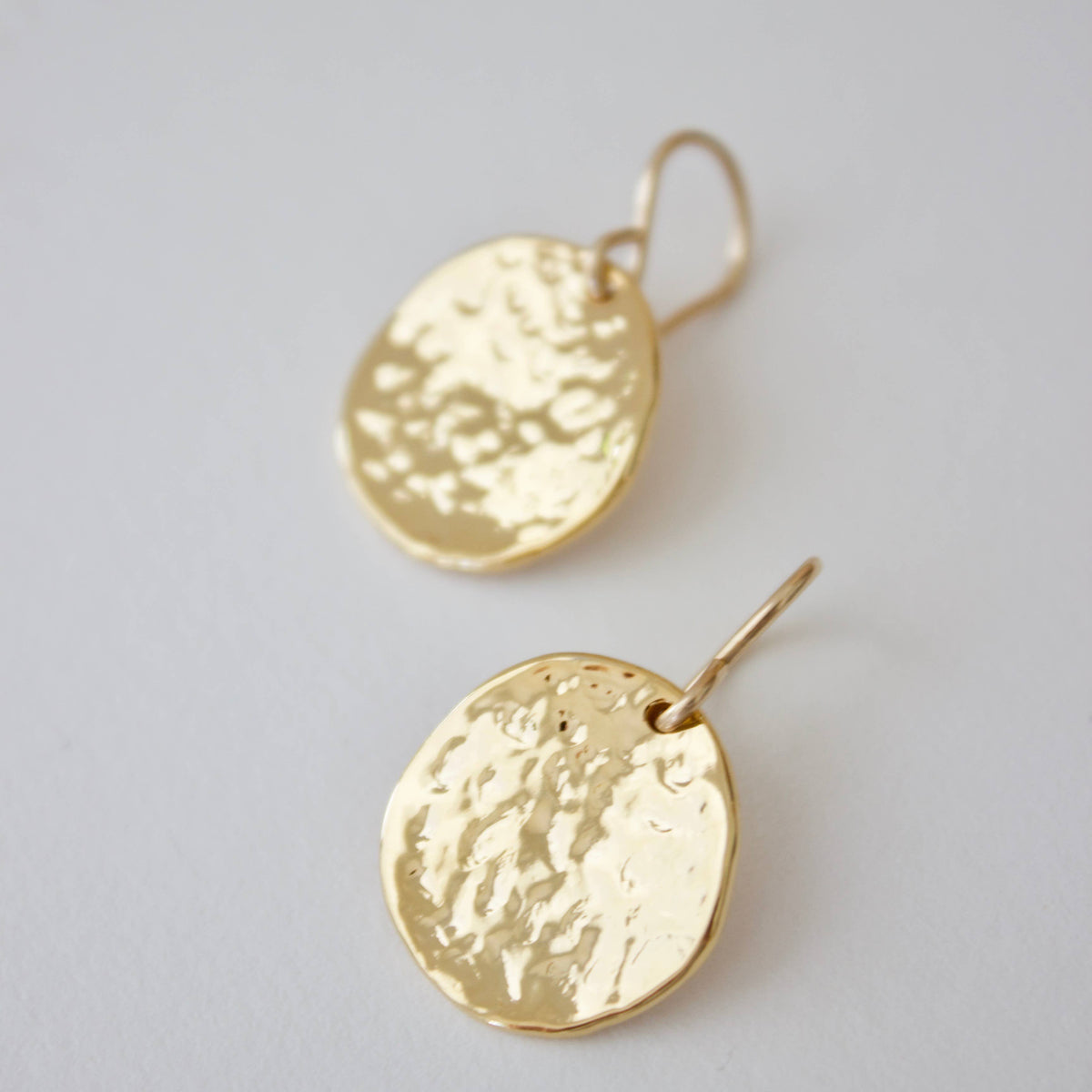 Hammered Medallion Earrings: Gold