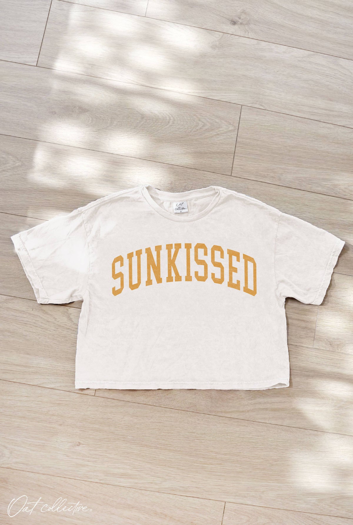 SUNKISSED Cropped Mineral Graphic Top: CREAM